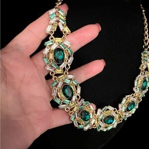 Dark green synthetic emeralds and rhinestones on gold tone chain